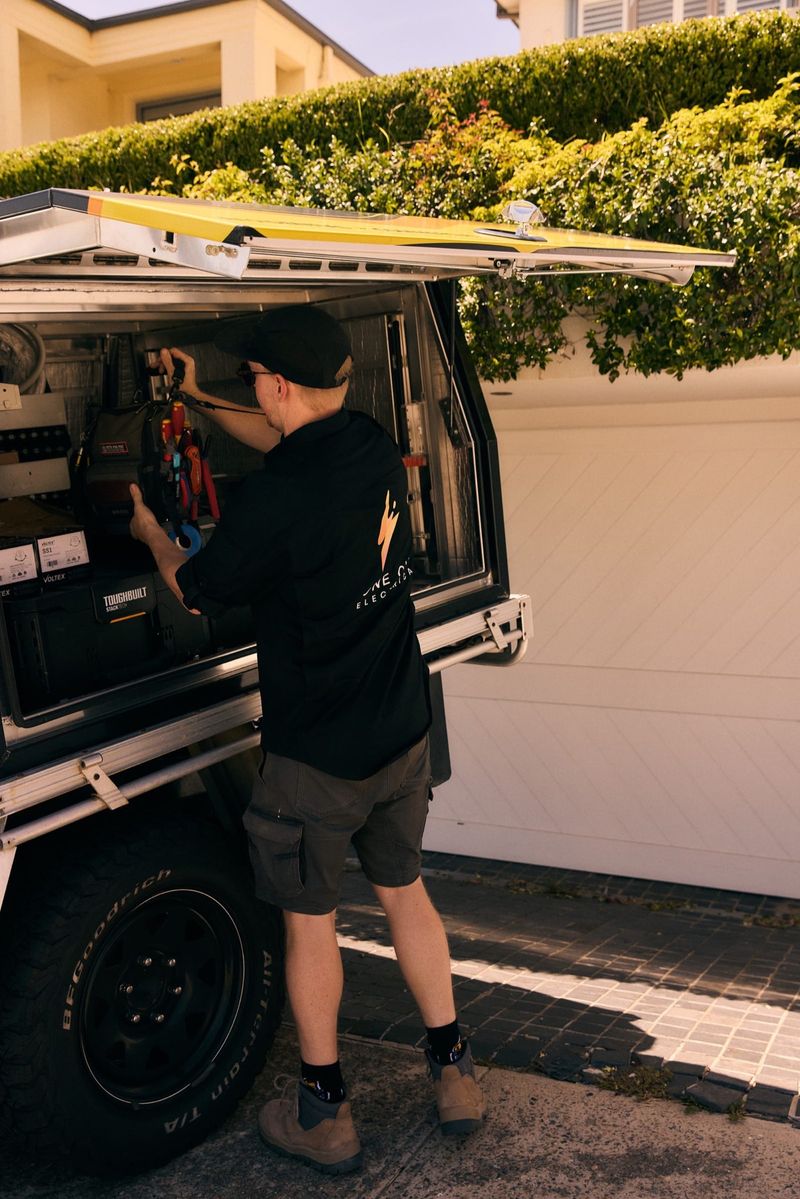 One Out Electrical electrician sourcing tools from an organised service vehicle in Hobart